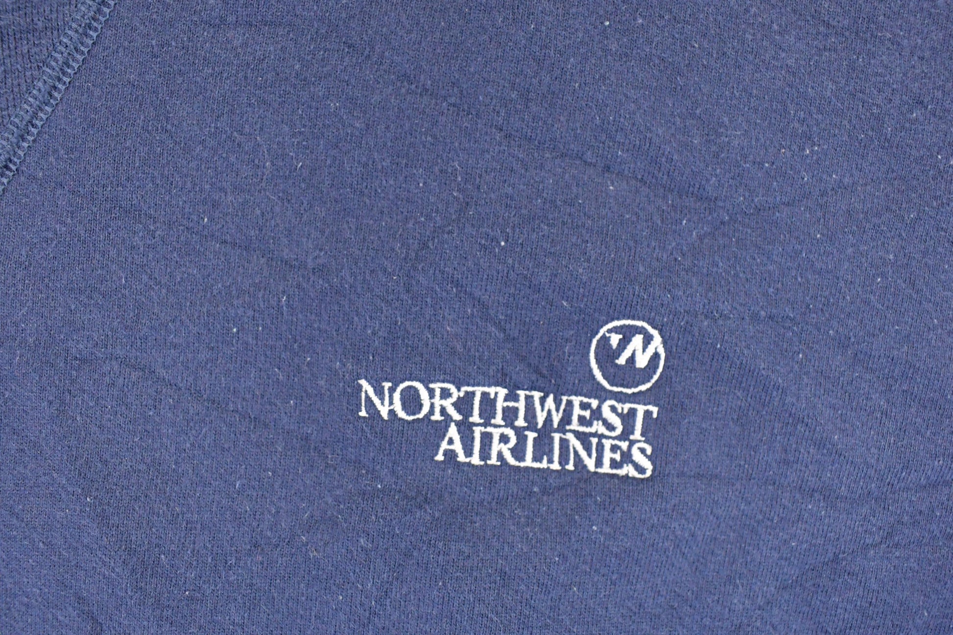 Vintage 1990s Northwest Airlines Embroidered Crewneck Sweatshirt Mens L from propervintagecanada