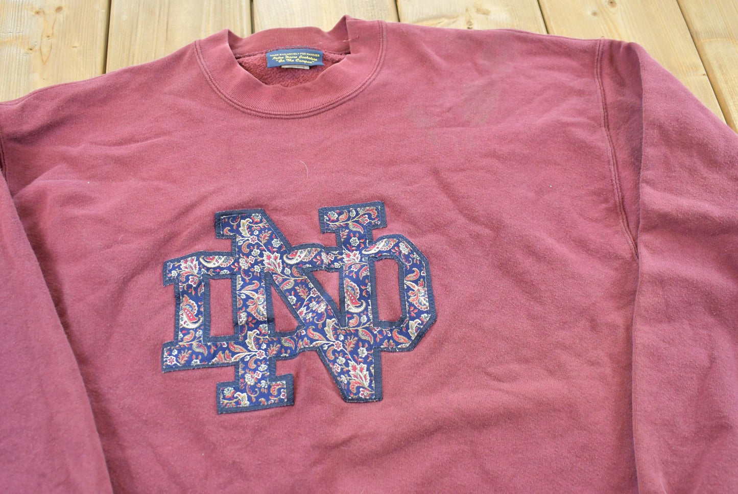 Vintage 1990s Notre Dame Fightin Irish Paisley Logo Collegiate Crewneck Sweatshirt Men's M from propervintagecanada
