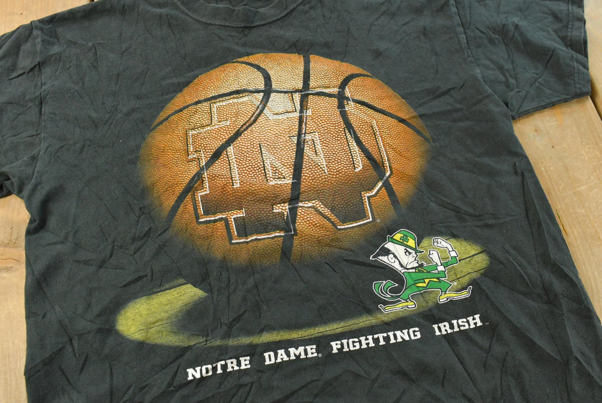 Vintage 1990s Notre Dame Fighting Irish Basketball University Collegiate T-Shirt Men's L from propervintagecanada