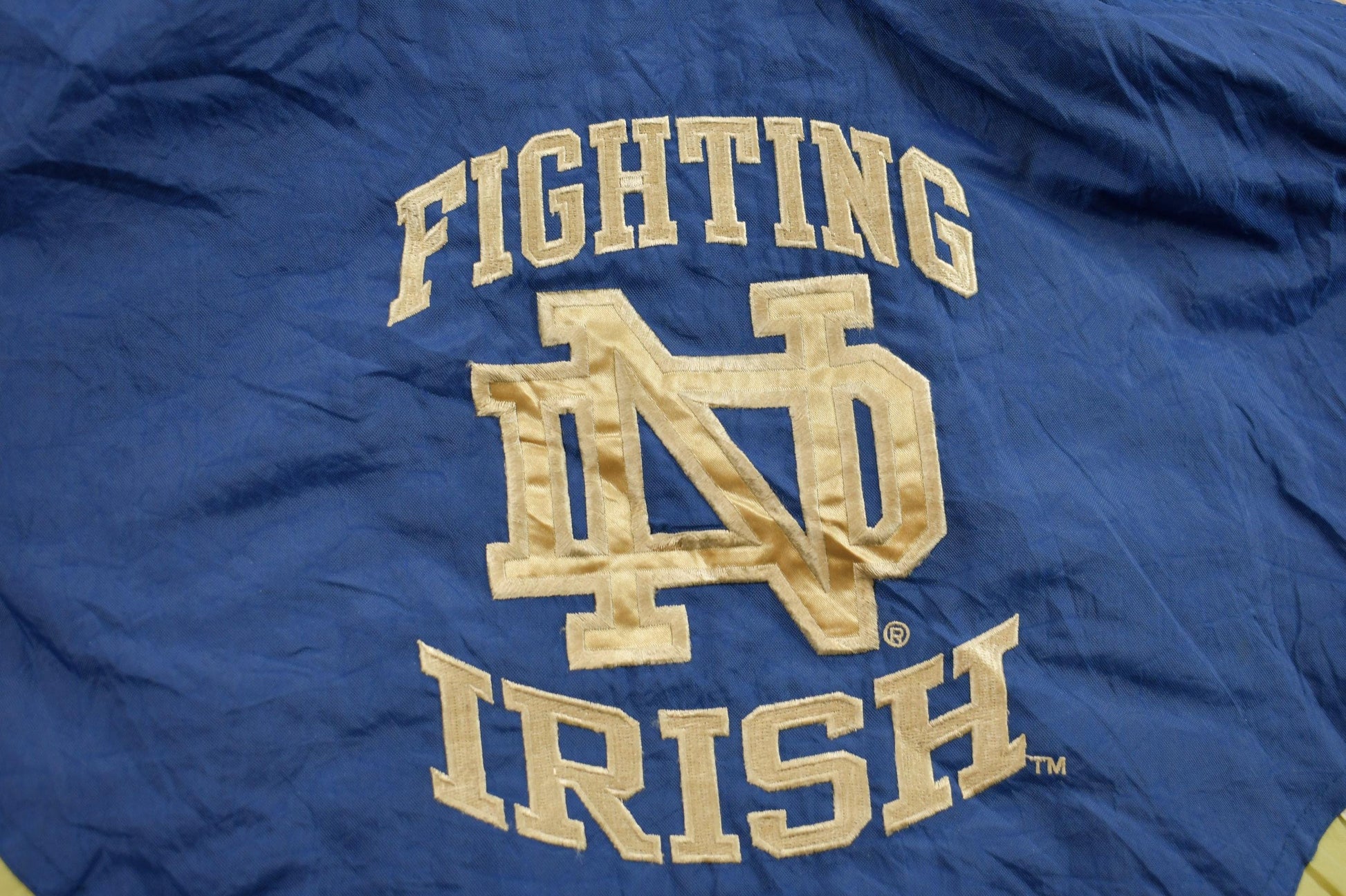 Vintage 1990s Notre Dame Fighting Irish Starter Quarter Zip Puffer Jacket Men's Medium from propervintagecanada