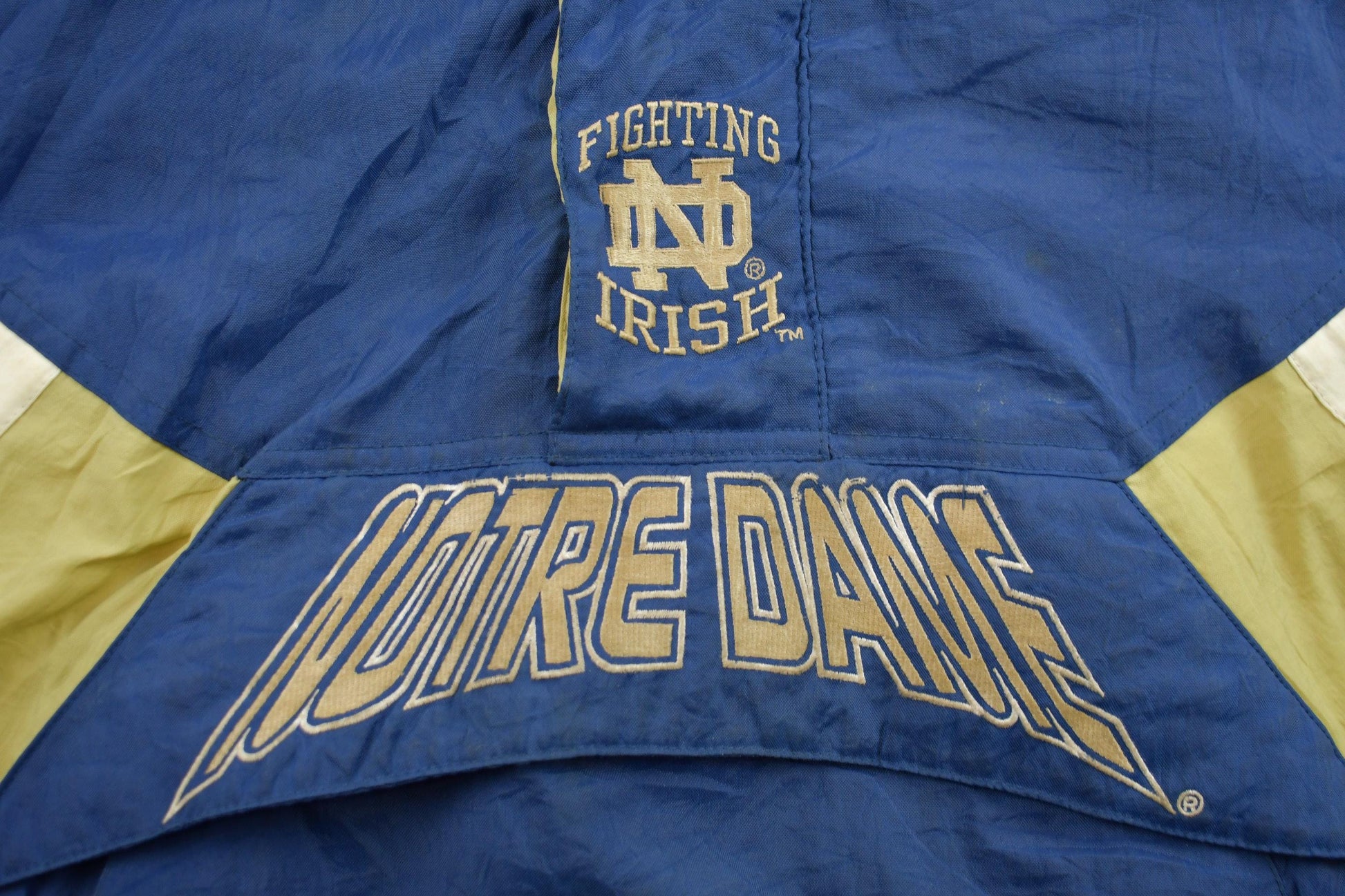 Vintage 1990s Notre Dame Fighting Irish Starter Quarter Zip Puffer Jacket Men's Medium from propervintagecanada