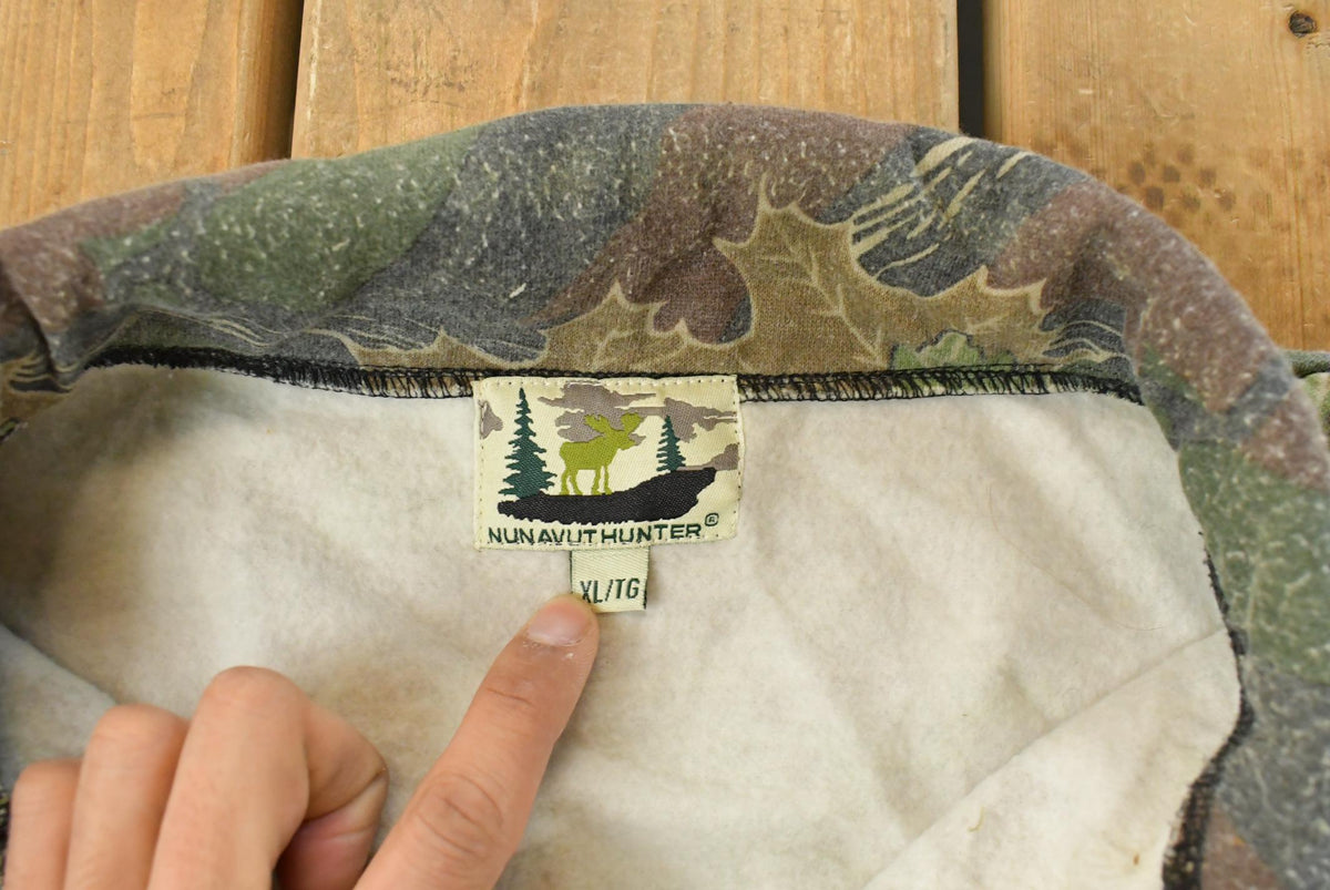 Vintage 1990s Nunavut Hunter Tree Camo Quarter Zip Sweatshirt Men's XL from propervintagecanada
