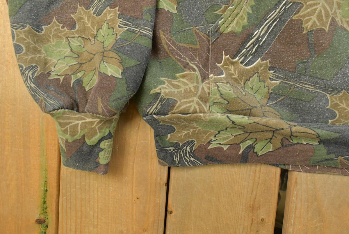 Vintage 1990s Nunavut Hunter Tree Camo Quarter Zip Sweatshirt Men's XL from propervintagecanada