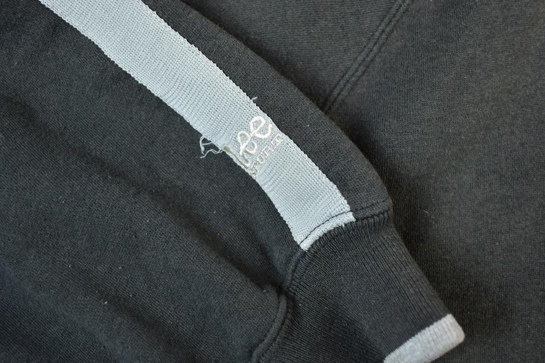 Vintage 1990s Oakland Raiders NFL Football Lee Sport Hooded Sweater Jacket from propervintagecanada