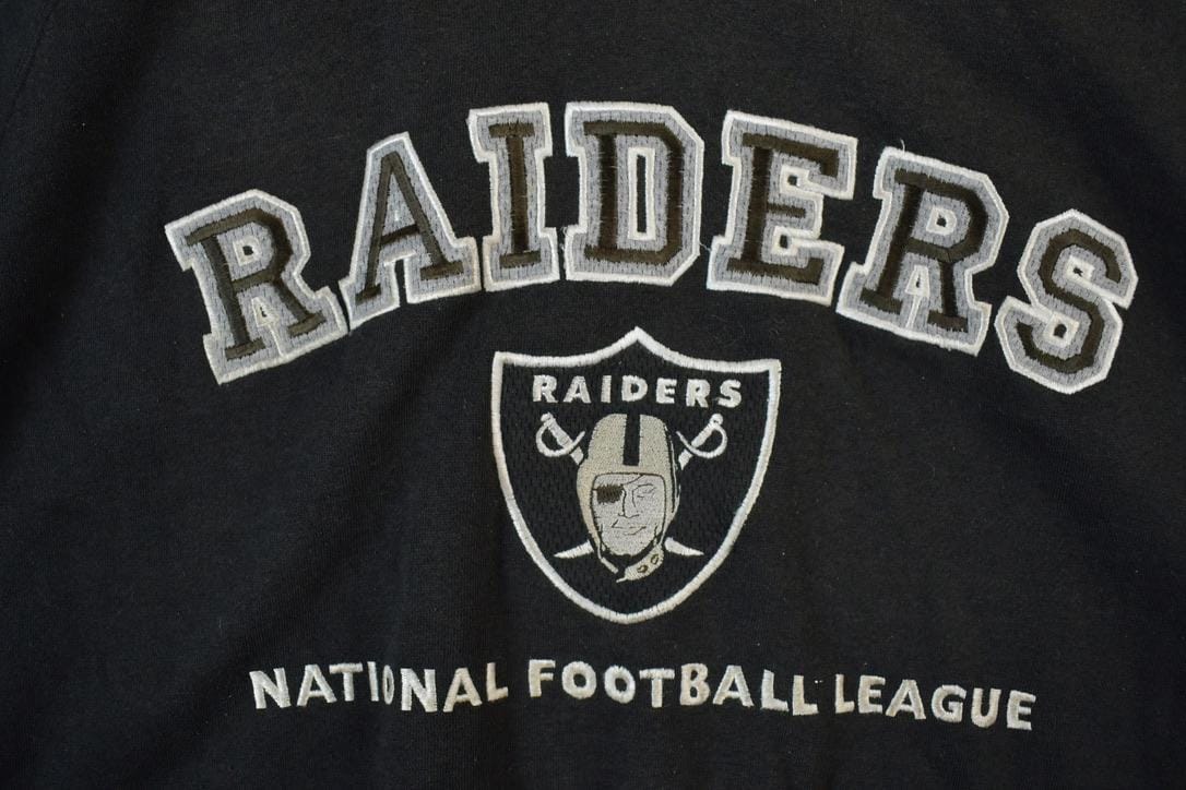 Vintage 1990s Oakland Raiders NFL Football Lee Sport Hooded Sweater Jacket from propervintagecanada