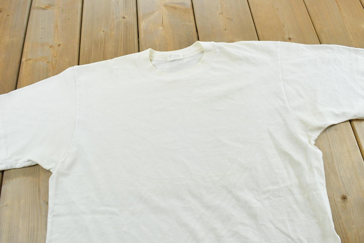 Vintage 1990s Oakton Blank White T-Shirt M Men's Medium from propervintagecanada