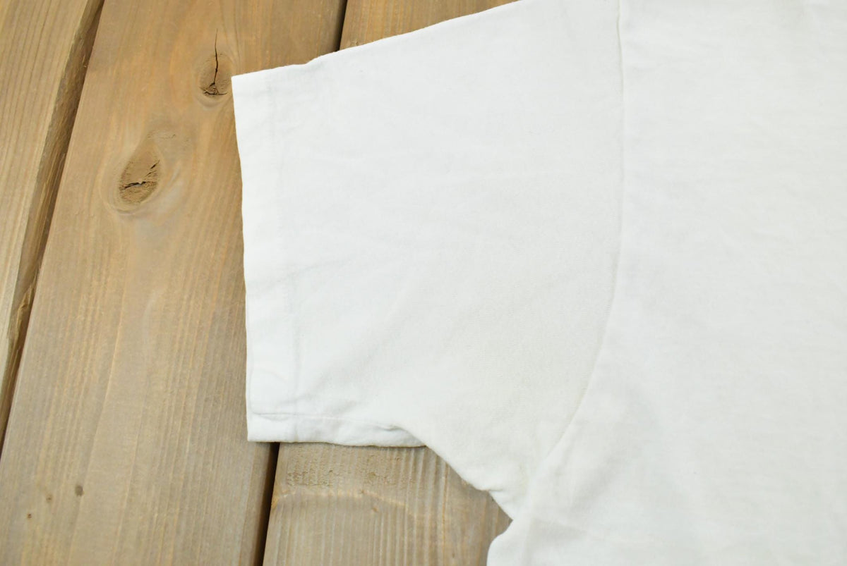 Vintage 1990s Oakton Blank White T-Shirt M Men's Medium from propervintagecanada