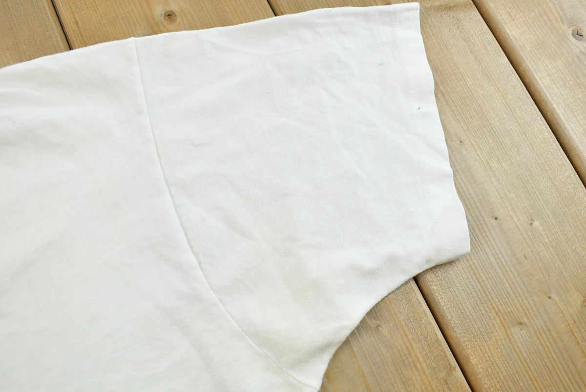 Vintage 1990s Oakton Blank White T-Shirt M Men's Medium from propervintagecanada