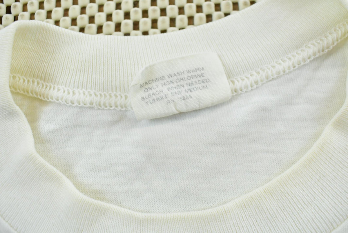 Vintage 1990s Oakton Blank White T-Shirt M Men's Medium from propervintagecanada
