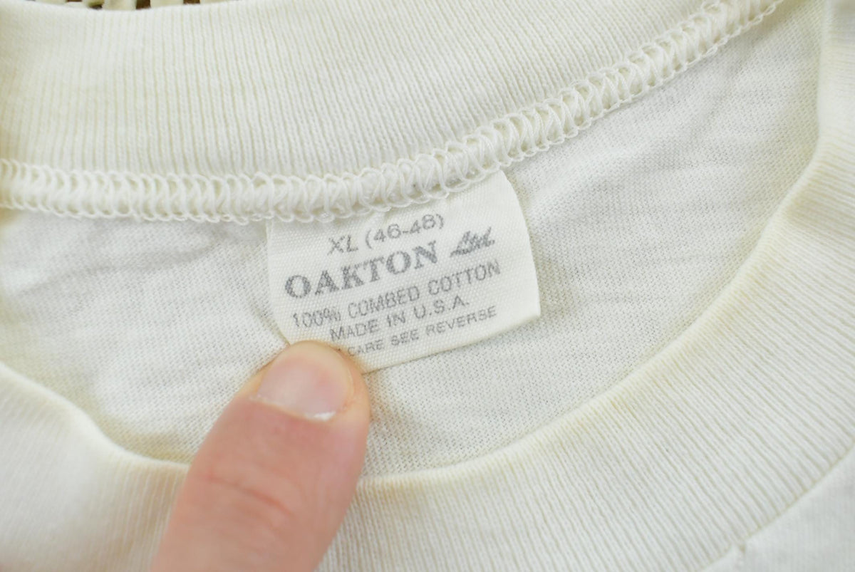 Vintage 1990s Oakton Blank White T-Shirt M Men's Medium from propervintagecanada
