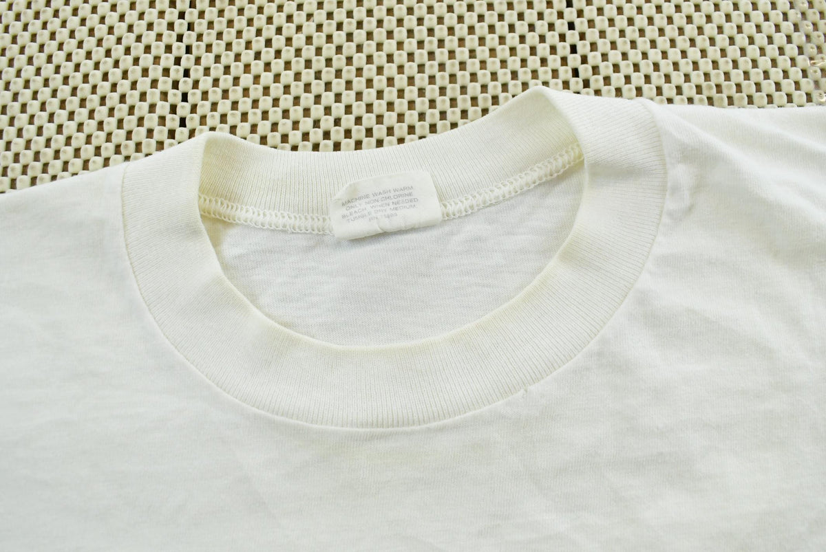 Vintage 1990s Oakton Blank White T-Shirt M Men's Medium from propervintagecanada