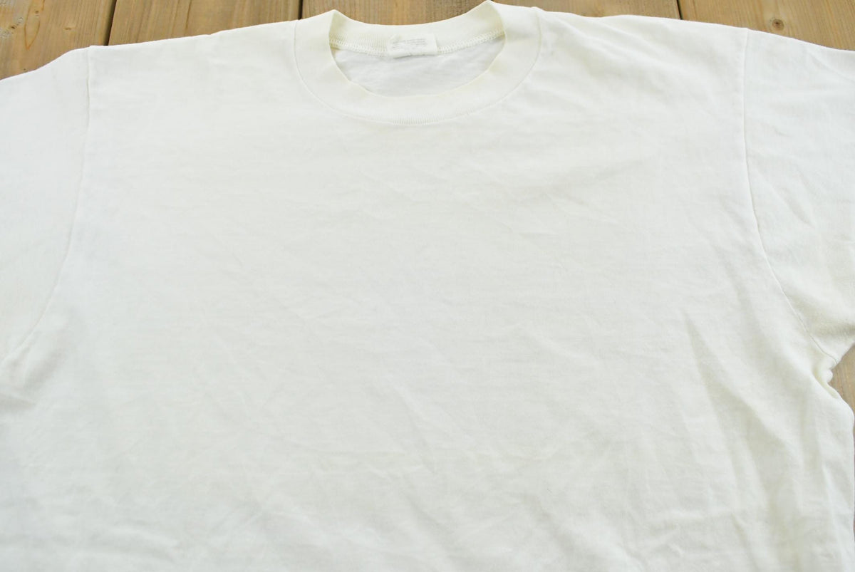 Vintage 1990s Oakton Blank White T-Shirt M Men's Medium from propervintagecanada