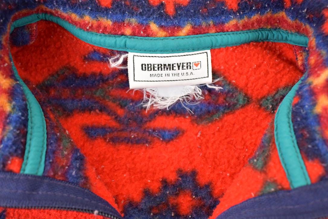 Vintage 1990s Obermeyer Aztec AOP Fleece Outdoorsman Sweater Men's S from propervintagecanada