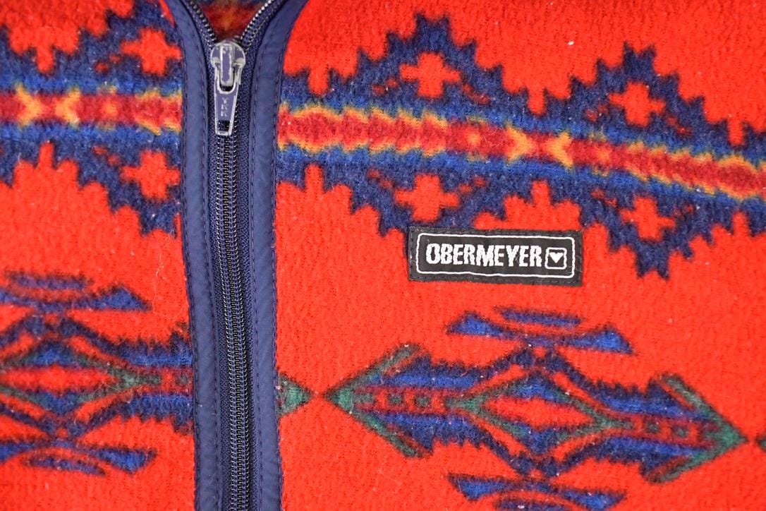 Vintage 1990s Obermeyer Aztec AOP Fleece Outdoorsman Sweater Men's S from propervintagecanada