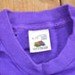 Vintage 1990s Off Campus International Agency Western Orientation Graphic T Shirt Men's XL from propervintagecanada