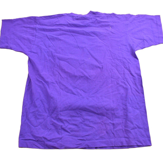 Vintage 1990s Off Campus International Agency Western Orientation Graphic T Shirt Men's XL from propervintagecanada