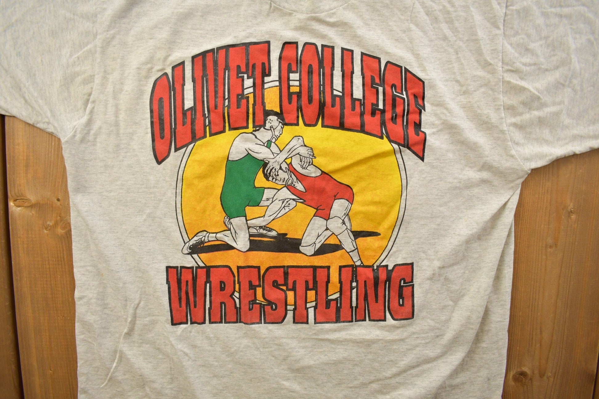 Vintage 1990s Olivet College Wrestling Collegiate T-Shirt Men's Medium from propervintagecanada