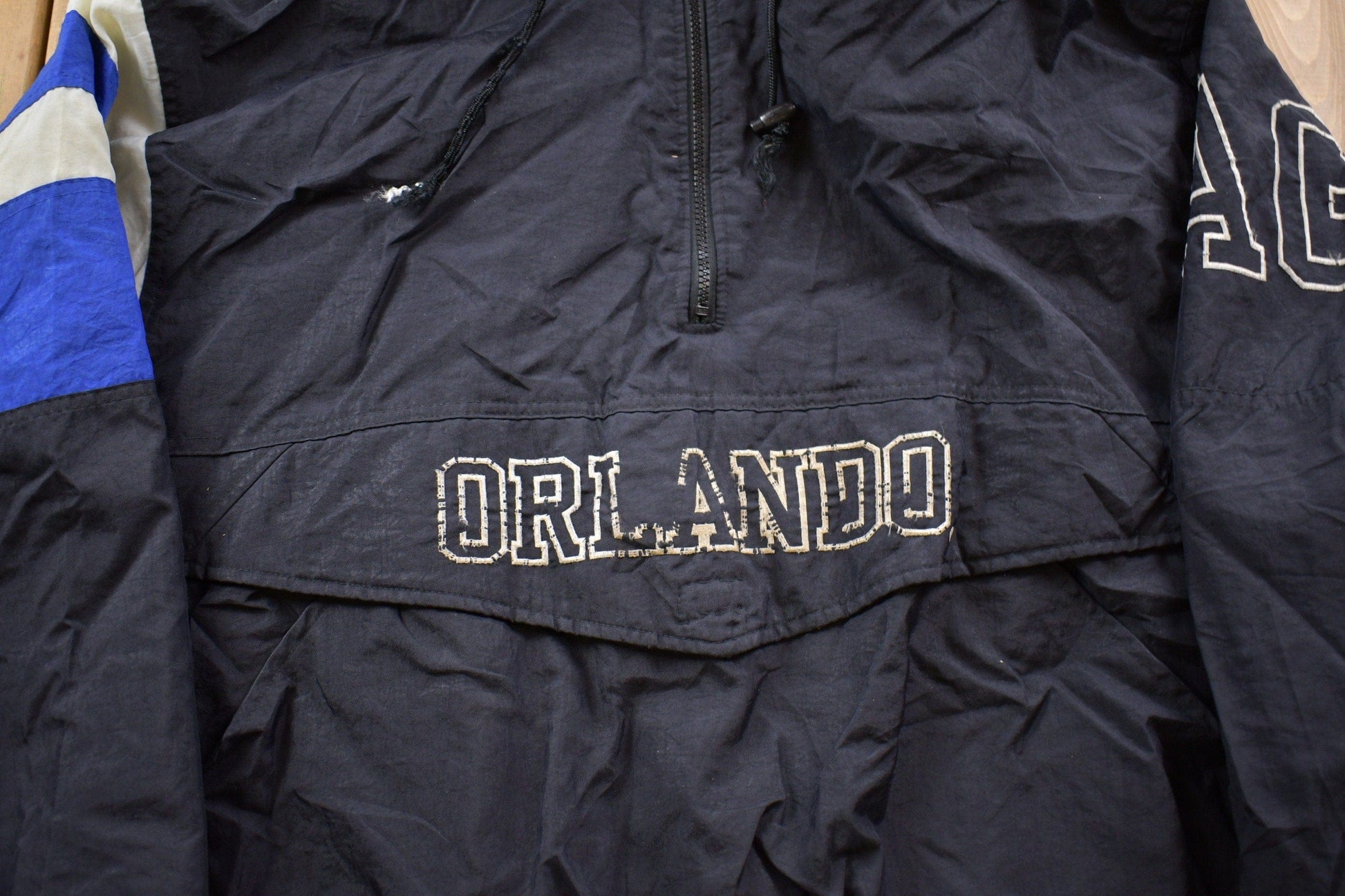 Vintage 1990s Orlando Magic NBA Starter Pro Line Quarter Zip Puffer Jacket Men's Large from propervintagecanada