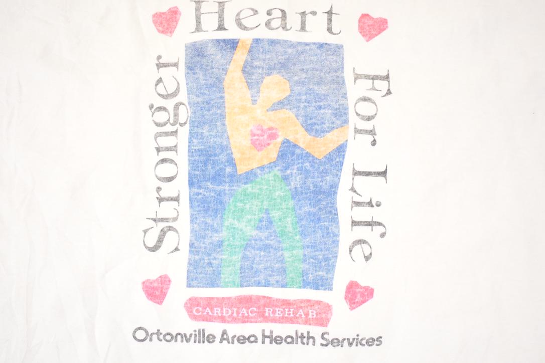 Vintage 1990s Ortonville Health Services Souvenir Travel T-Shirt Men's XL from propervintagecanada