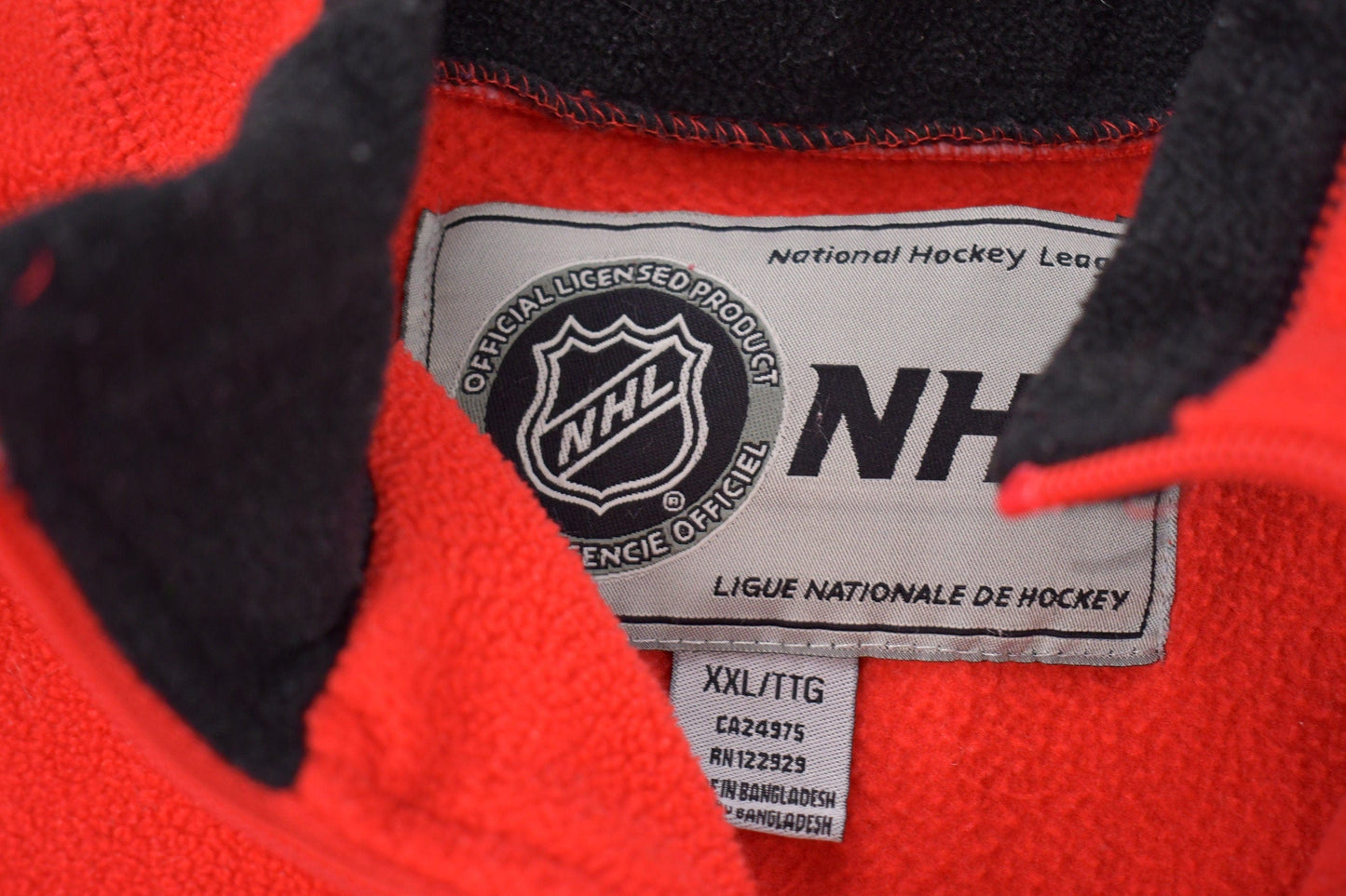 Vintage 1990s Ottawa Senators NHL Quarter Zip Embroidered Fleece Sweater Men's 2XL from propervintagecanada