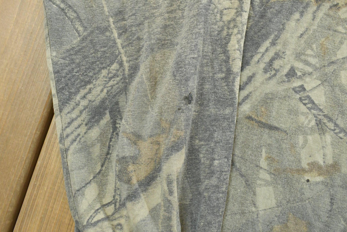 Vintage 1990s Outdoors RealTree Hardwoods Camo Long Sleeve T-Shirt Men's XL from propervintagecanada