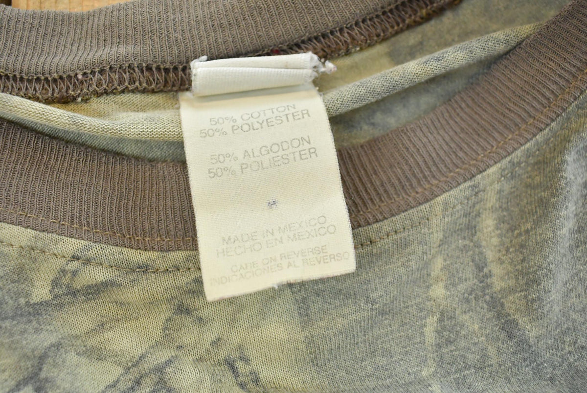 Vintage 1990s Outdoors RealTree Hardwoods Camo Long Sleeve T-Shirt Men's XL from propervintagecanada