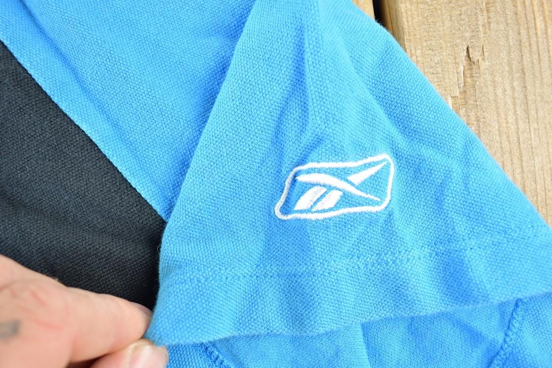 Vintage 1990s Panthers NFL Graphic Button Up PoloMen's XL from propervintagecanada