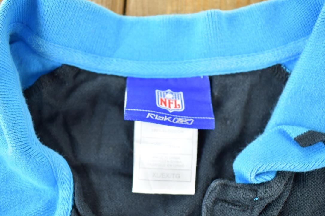 Vintage 1990s Panthers NFL Graphic Button Up PoloMen's XL from propervintagecanada