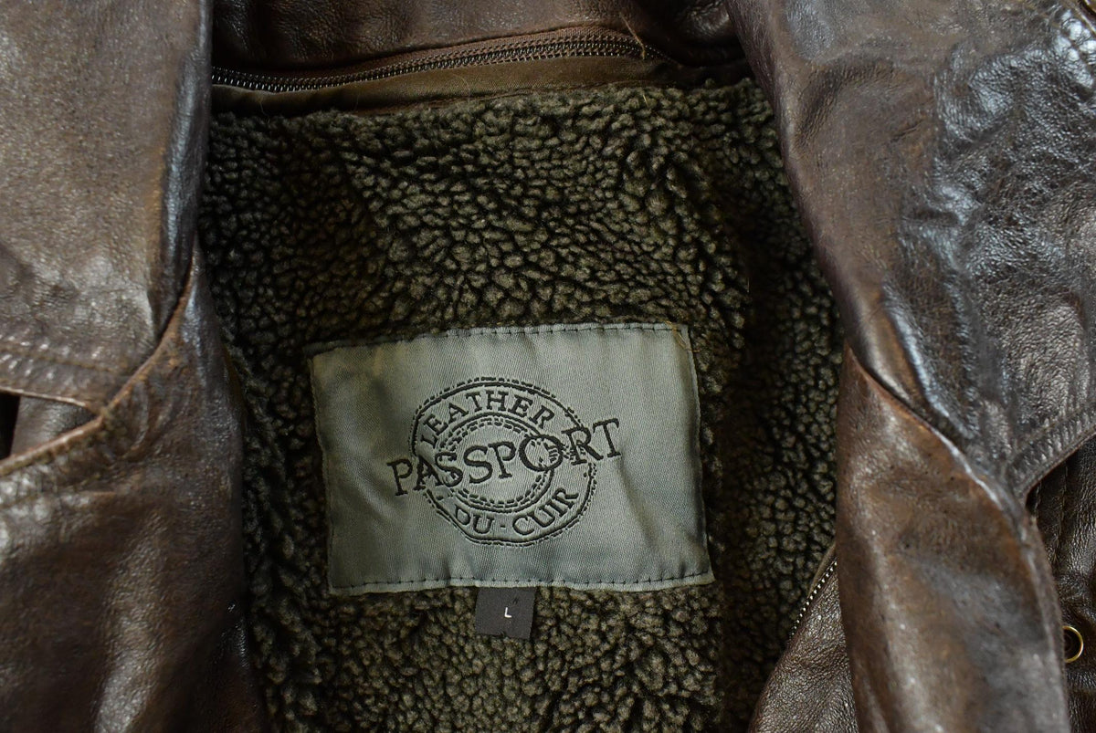 Vintage 1990s Passport Leather Motorcycle Biker Jacket Men's L from propervintagecanada