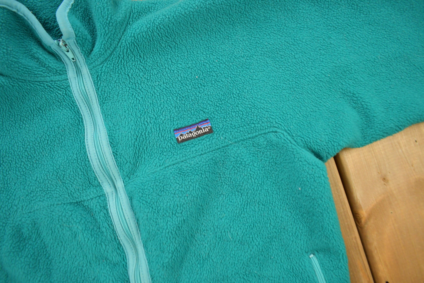 Vintage 1990s Patagonia Full Zip Turquoise Fleece Sweater Men's Medium from propervintagecanada