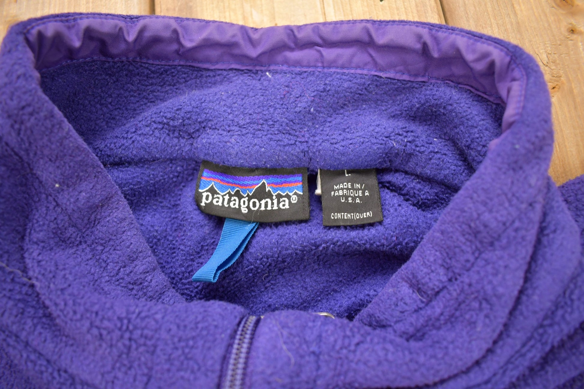 Vintage 1990s Patagonia Purple Half Zip Cinched Sweatshirt Men's Large from propervintagecanada