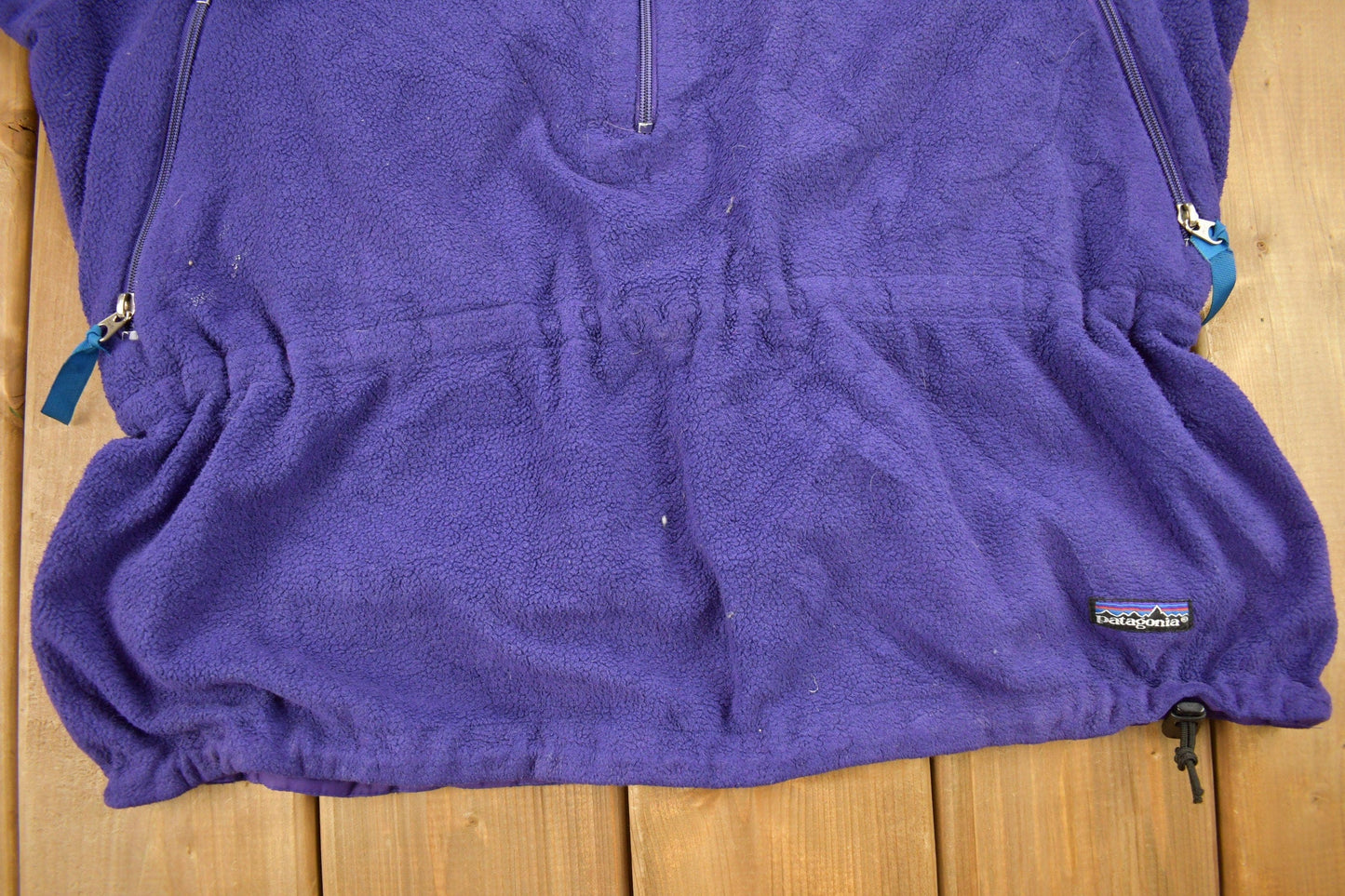 Vintage 1990s Patagonia Purple Half Zip Cinched Sweatshirt Men's Large from propervintagecanada