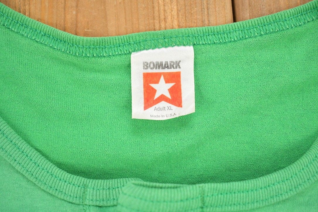 Vintage 1990s Peace Softball Quarter Button Shirt Men's Large from propervintagecanada