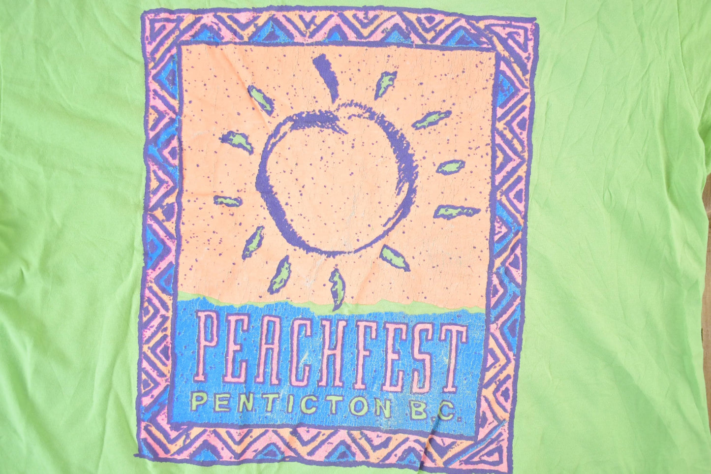 Vintage 1990s Peach fest Penticton B.C Souvenir Single Stitch Graphic Print T-Shirt Made In USA Men's Large from propervintagecanada