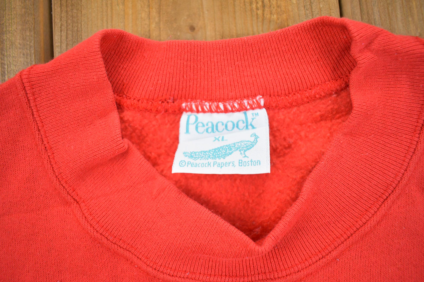 Vintage 1990s Peacock Red Crewneck Sweatshirt Men's XL from propervintagecanada