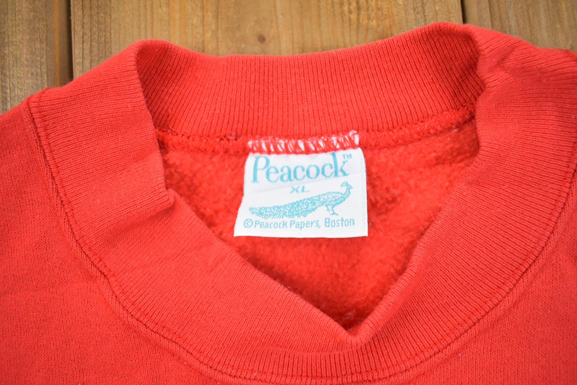 Vintage 1990s Peacock Red Crewneck Sweatshirt Men's XL from propervintagecanada