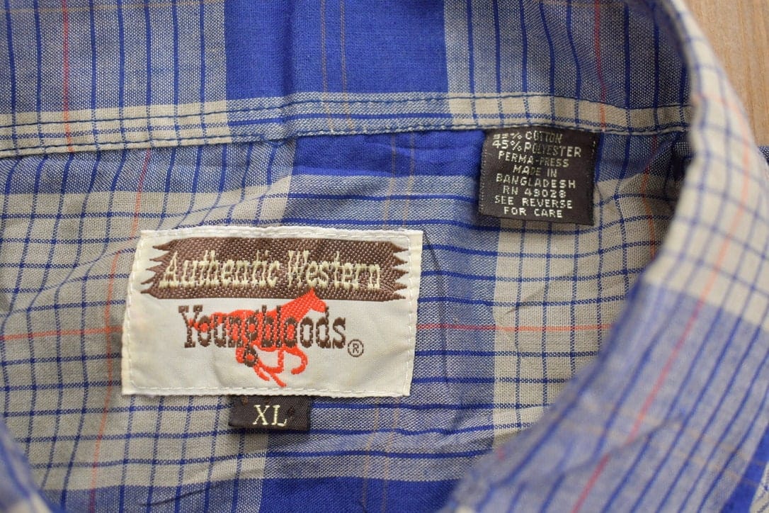 Vintage 1990s Pearl Snap Plaid Flannel Button Up Shirt Men's XL from propervintagecanada