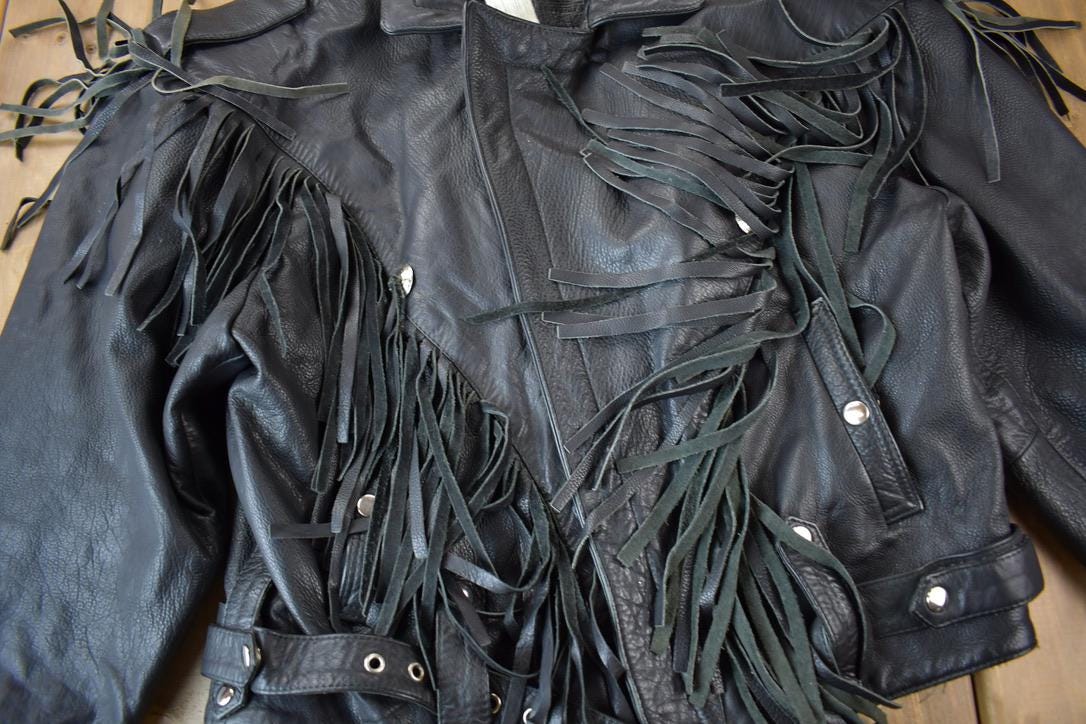 Vintage 1990s Pelle Cuir Leather Fringed Jacket Men's Large from propervintagecanada