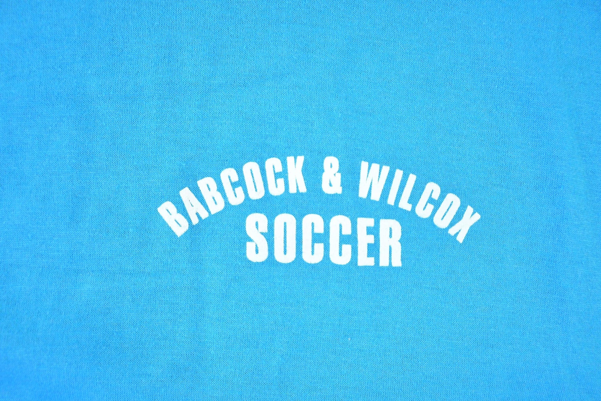 Vintage 1990s Penmans Soccer Souvenir Single Stitch Graphic Print T-Shirt Made In USA Men's XL from propervintagecanada