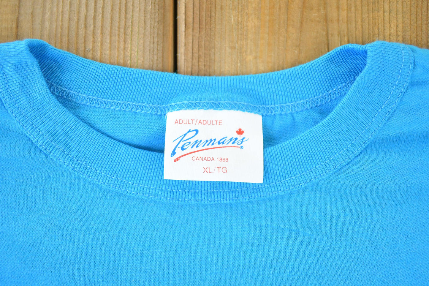 Vintage 1990s Penmans Soccer Souvenir Single Stitch Graphic Print T-Shirt Made In USA Men's XL from propervintagecanada