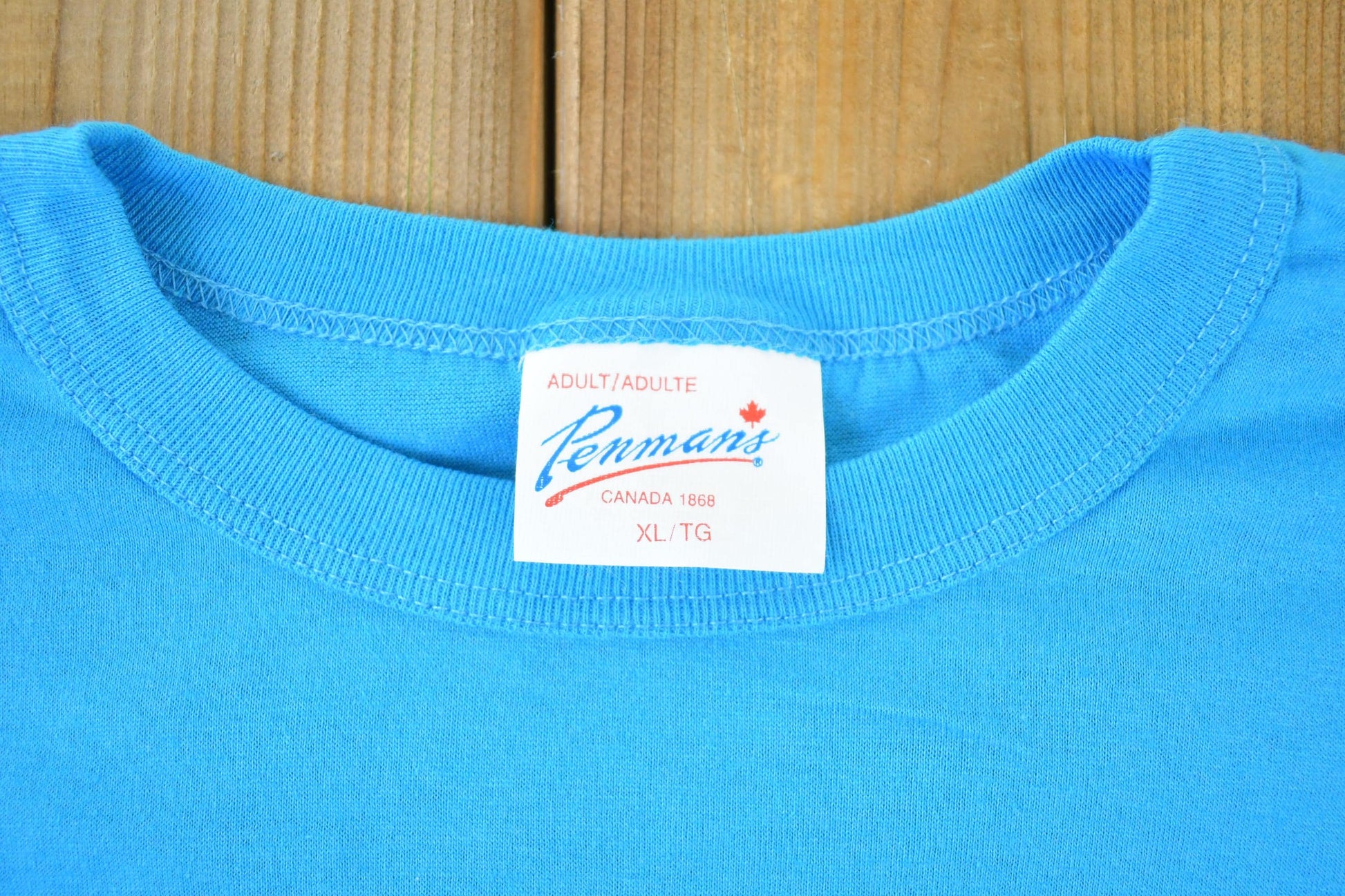 Vintage 1990s Penmans Soccer Souvenir Single Stitch Graphic Print T-Shirt Made In USA Men's XL from propervintagecanada