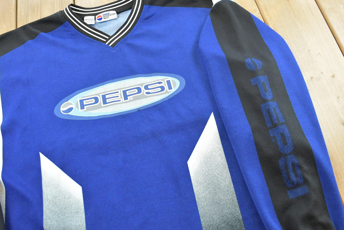 Vintage 1990s Pepsi Soda Long Sleeve Graphic Jersey Shirt Men's XL from propervintagecanada