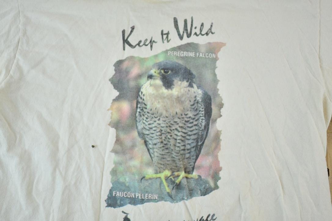Vintage 1990s Peregrine Falcon Keep It Wild Graphic T-Shirt Men's Large from propervintagecanada