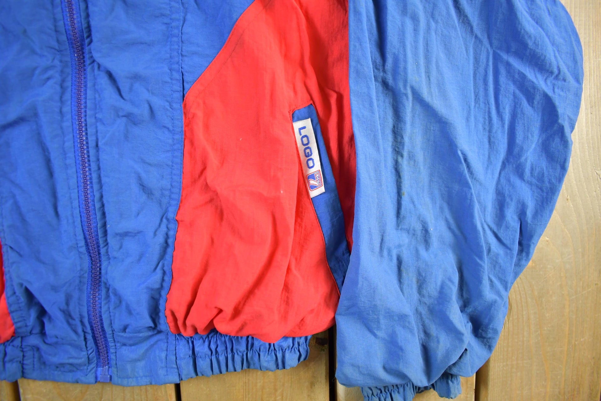 Vintage 1990s Philadelphia 76ers Logo 7 NBA Windbreaker Men's Large from propervintagecanada