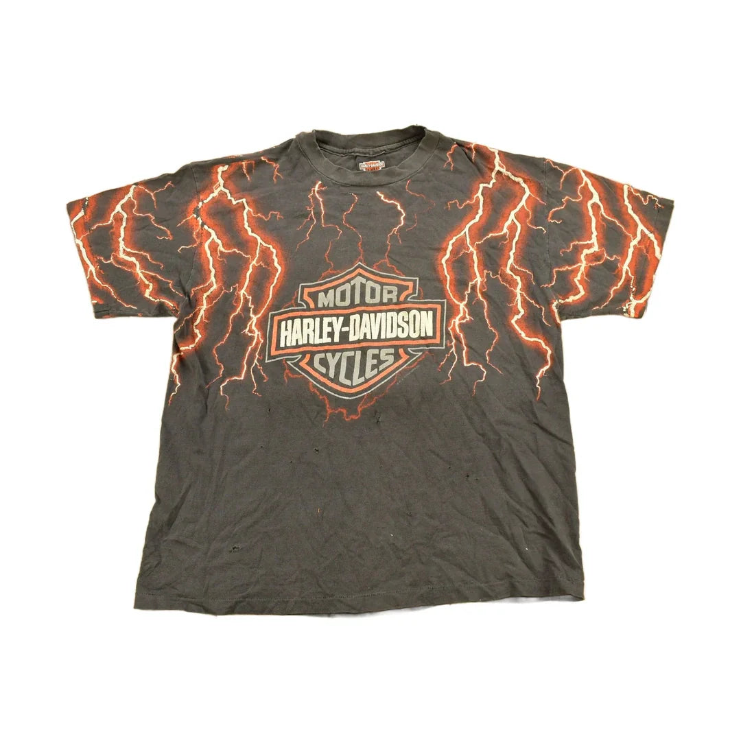 Vintage 1990s Pierce Harley Davidson De Kalb Illinois Lightning Graphic T-Shirt Men's Large from propervintagecanada