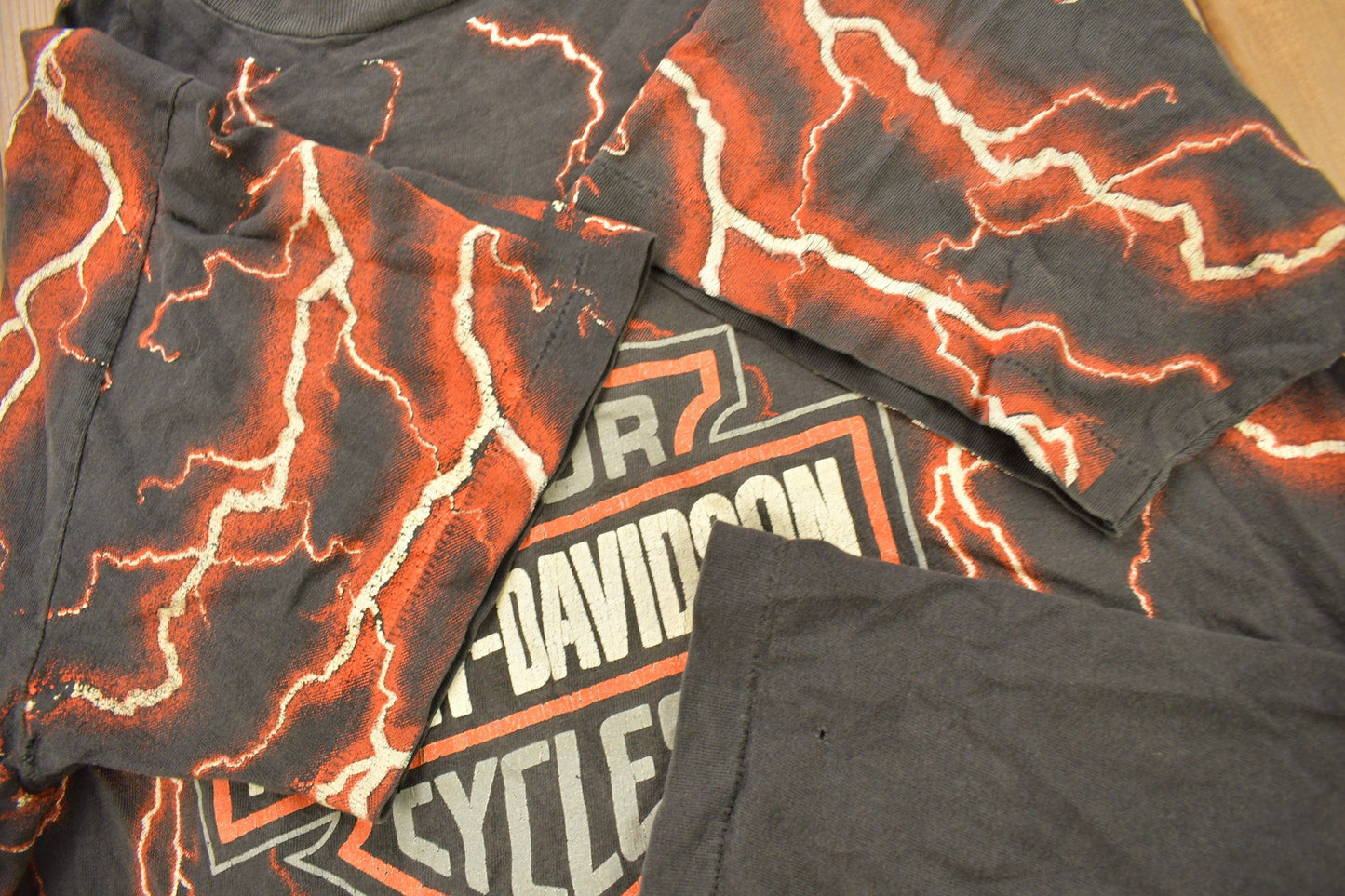 Vintage 1990s Pierce Harley Davidson De Kalb Illinois Lightning Graphic T-Shirt Men's Large from propervintagecanada