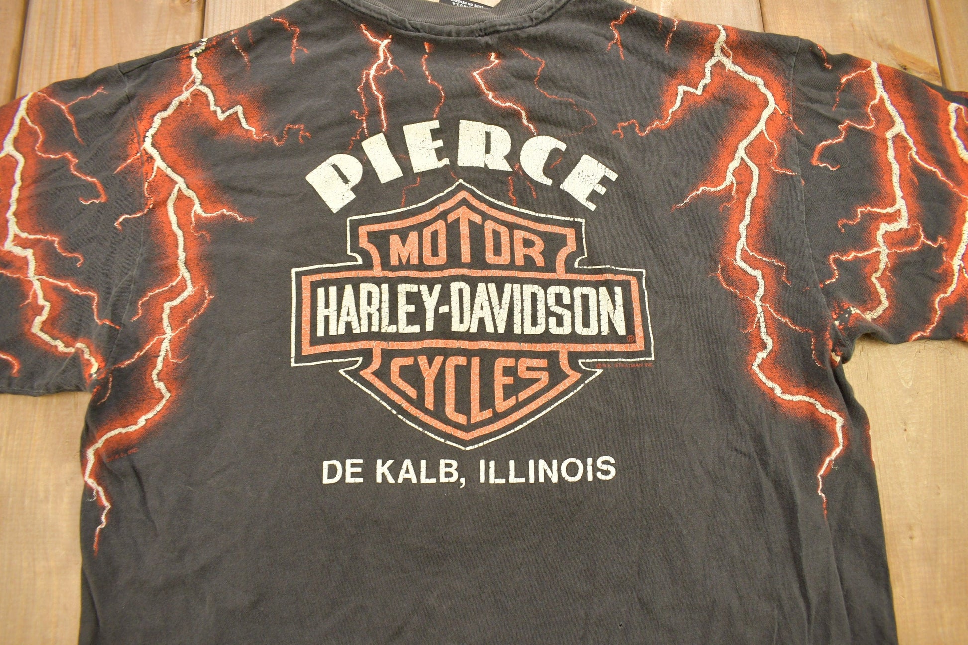 Vintage 1990s Pierce Harley Davidson De Kalb Illinois Lightning Graphic T-Shirt Men's Large from propervintagecanada