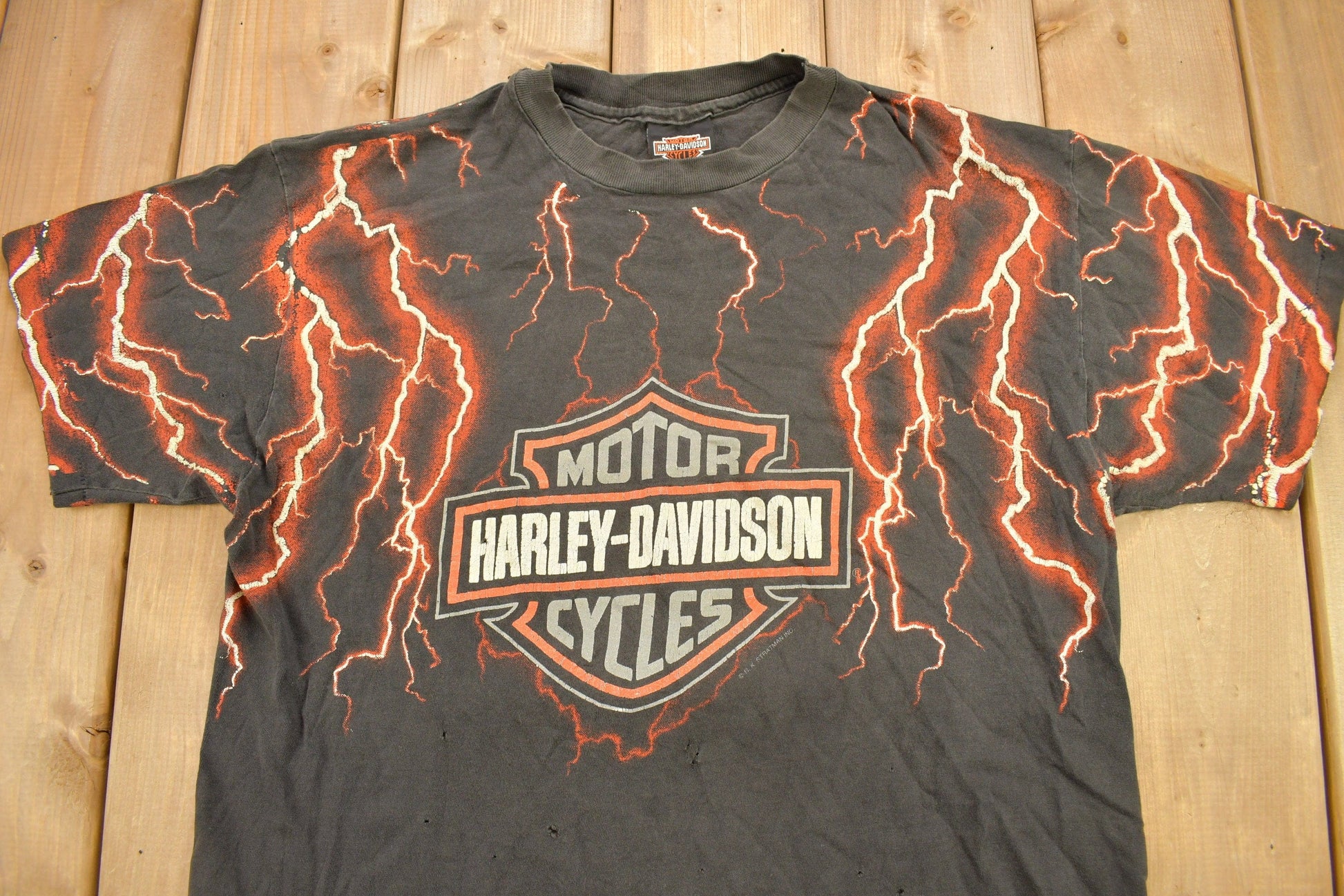 Vintage 1990s Pierce Harley Davidson De Kalb Illinois Lightning Graphic T-Shirt Men's Large from propervintagecanada