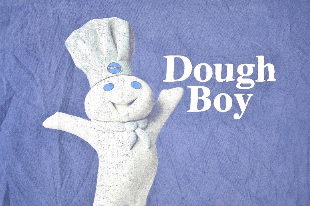 Vintage 1990s Pillsbury Doughboy Souvenir Travel T-Shirt Men's XL from propervintagecanada