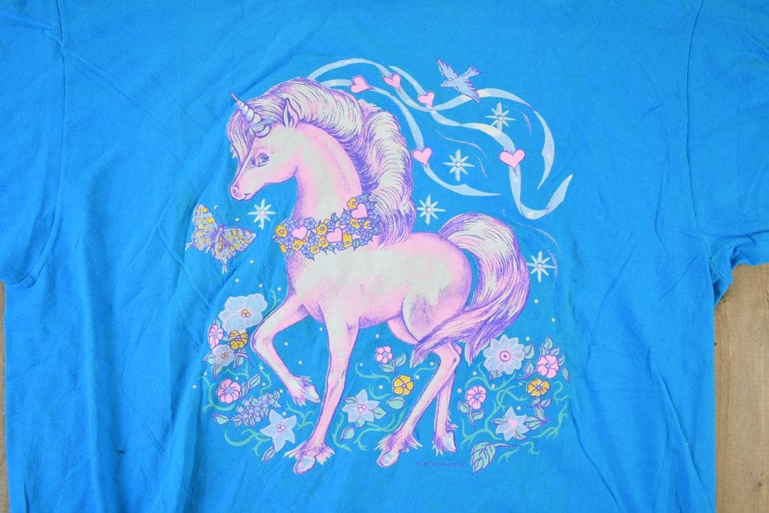 Vintage 1990s Pink Pony Unicorn Club Souvenir Single Stitch Graphic Print T-Shirt Men's 2XL from propervintagecanada